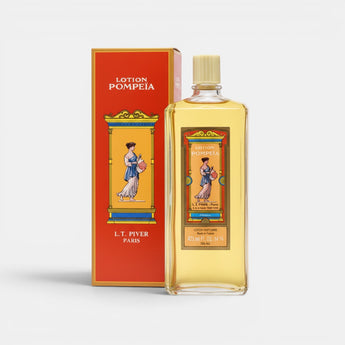 Lotion Pompeïa de L.T. Piver, parfum floral et herbacé dans une bouteille en verre jaune avec une boîte assortie. Fabriqué en France.